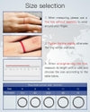 Instruction guide for measuring finger size with images showing a finger with a fine line, a ring with a red string, and a ruler for accurate sizing