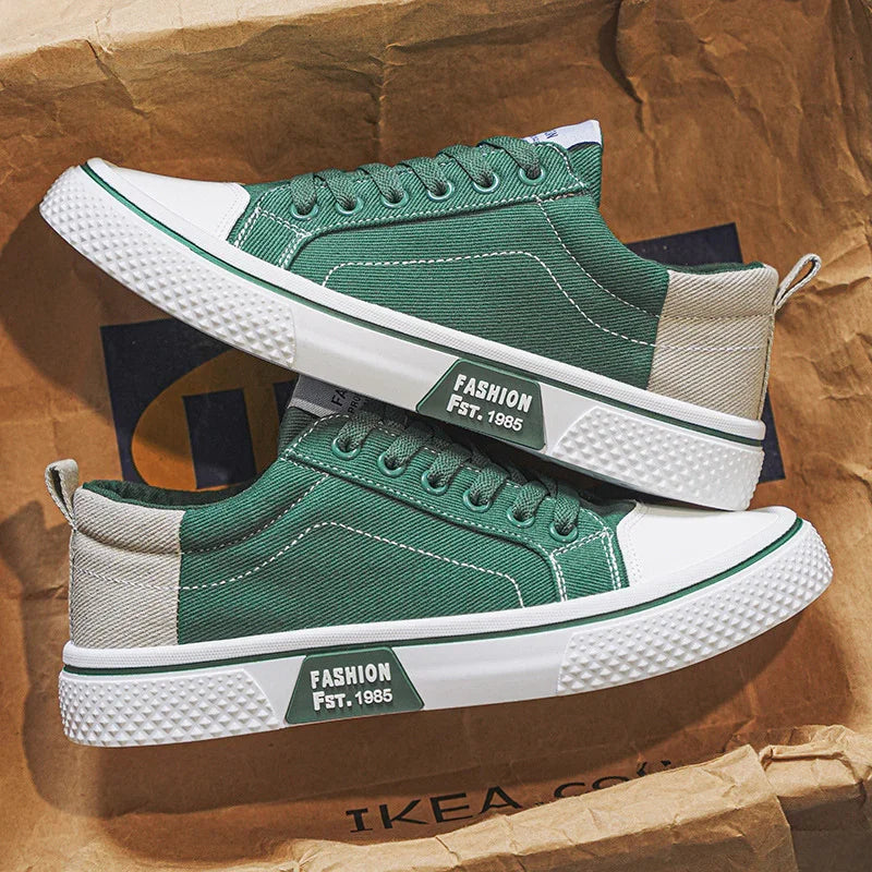 Green and beige canvas sneakers with white rubber sole, lace-up, modern streetwear style
