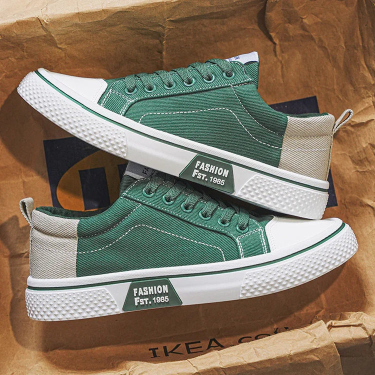 Green and beige canvas sneakers with white rubber sole, lace-up, modern streetwear style