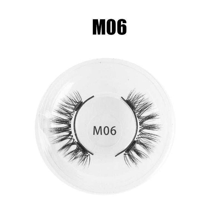 Voluminous black false eyelashes style M06 in round plastic case, wispy and dramatic