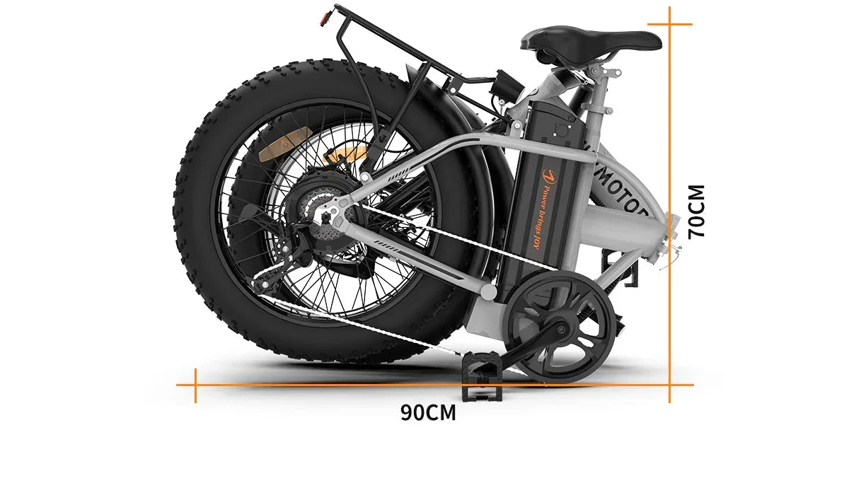 Folded gray electric bike with fat tires, compact size 90cm by 70cm, aluminum frame