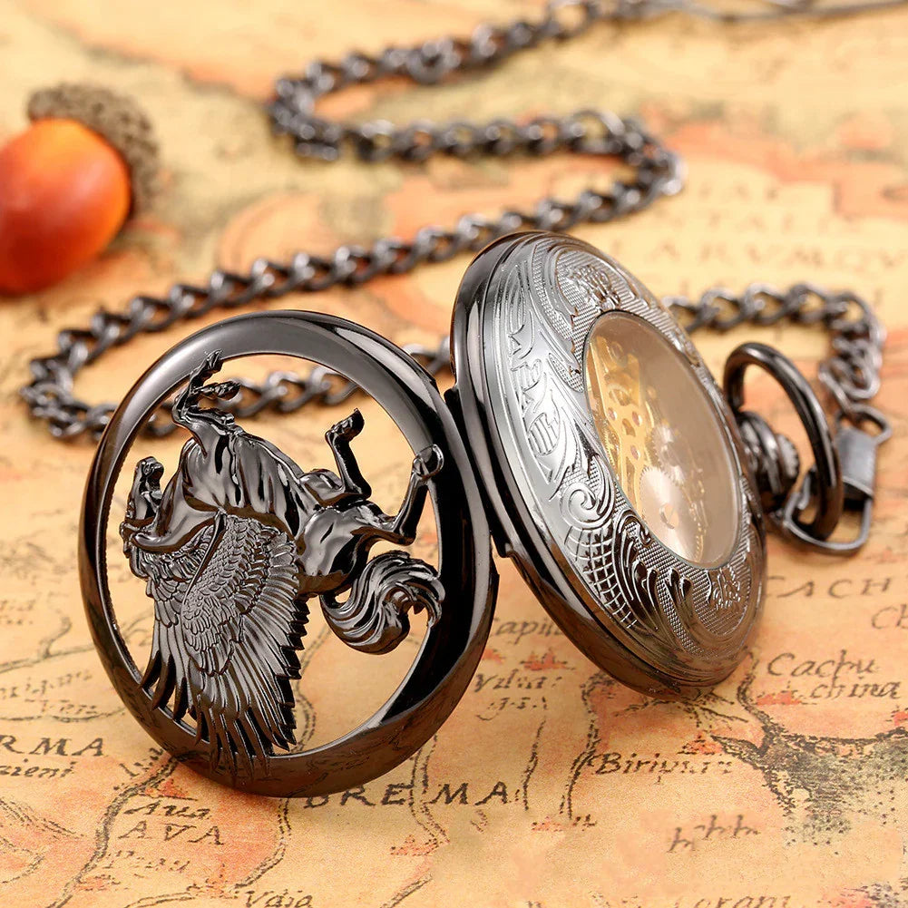 Vintage metallic pocket watch with winged horse design, intricate engraving, chain accessory