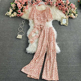 Beige short sleeve wide-leg pants set with red dotted pattern, lightweight flowy fabric, relaxed fit