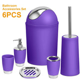 Modern purple bathroom accessories set with chrome accents, six pieces including trash can, soap dispenser, cups, toilet brush, and soap dish.