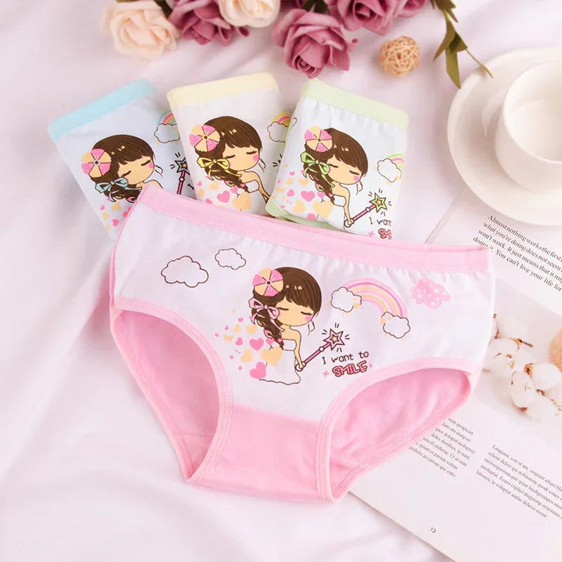 Cute pastel cotton girls' underwear with cartoon print, full coverage, soft elastic waistband.