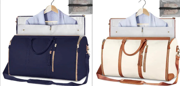 Two duffel travel bags, one navy blue and one cream with tan accents, displayed with hanging dress shirts and toiletry pouches, highlighting spacious, structured design and leather-like trim.