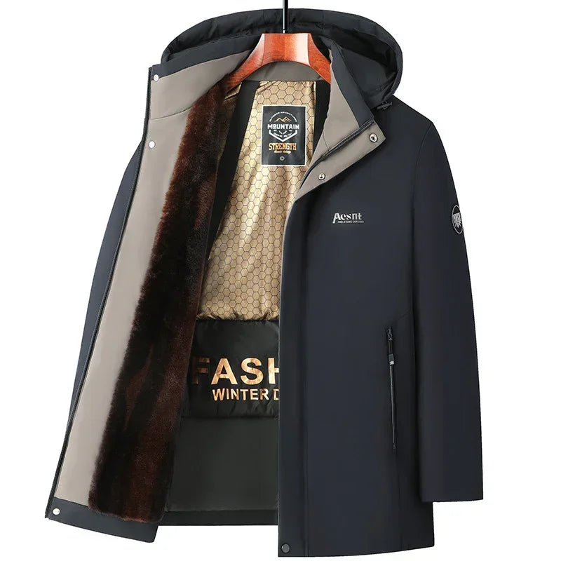 Black winter jacket with hood, faux fur lining, gold interior, and zip pockets.