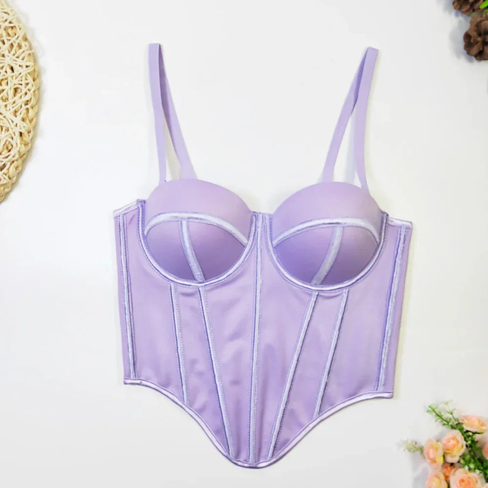 Lilac satin corset top with structured boning, adjustable straps, and fitted silhouette