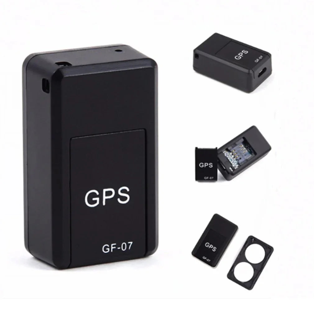 Black compact GPS tracker device with rectangular shape and visible internal circuit.
