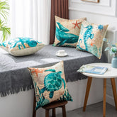 Coastal-themed throw pillows with marine animal prints, blue and beige cotton fabric, modern fit
