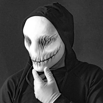 Black streetwear hoodie with relaxed fit, paired with white character mask and gloves