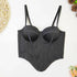 Black bustier top with structured cups, adjustable straps, and fitted waist, laid flat.