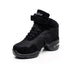 Black mesh high-top sneaker with suede panels, lace-up front, velcro strap, and chunky sole