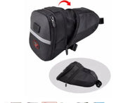 Black nylon bike saddle bag with zipper closure and reflective safety strip