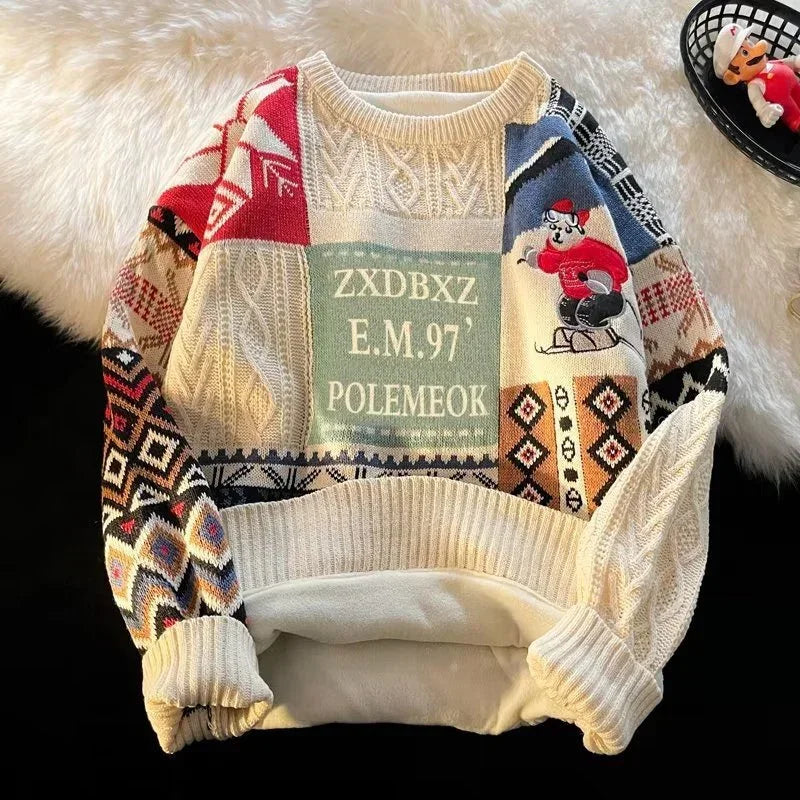 Colorful patchwork knit sweater with mixed patterns, cartoon graphic, relaxed fit, and ribbed cuffs