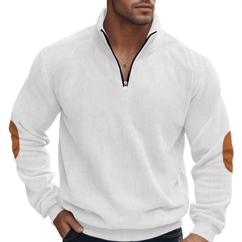 Men's white ribbed pullover with zip collar, brown suede elbow patches, relaxed fit.