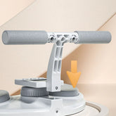 Close-up of a gray and white textured handle on a modern cleaning device with soft foam grips.