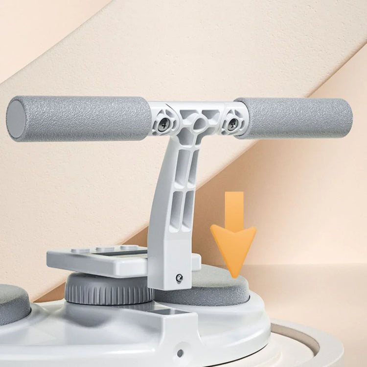 Close-up of a gray and white textured handle on a modern cleaning device with soft foam grips.