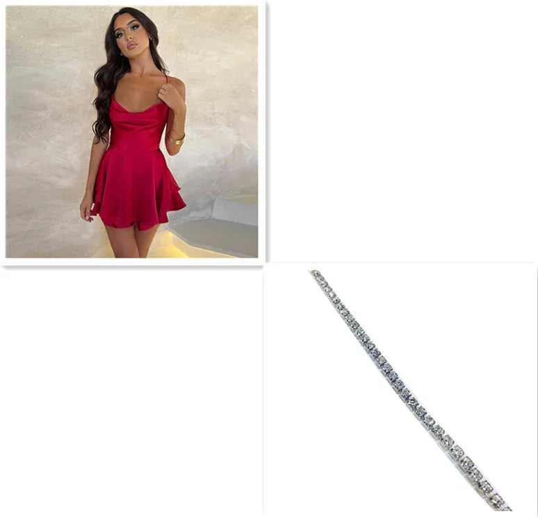Woman wearing a red satin mini dress with a flared skirt and slim fit, displayed with a sparkling silver bracelet.