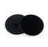 Two black round fabric patches with a smooth surface and minimalist design