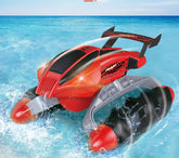 Red and black futuristic remote control car with large wheels driving on water