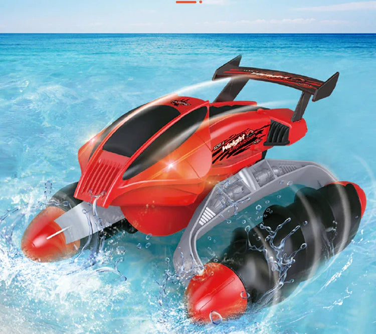 Red and black futuristic remote control car with large wheels driving on water