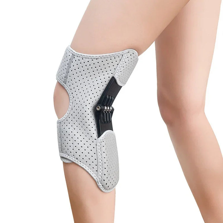 Light grey perforated knee support brace with adjustable straps and open patella design