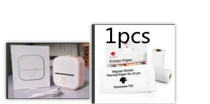 Compact white and pink mini thermal printer with charging cable and thermal paper rolls