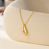 14K gold teardrop necklace for women with cubic zirconia pendant, elegant and simple design
