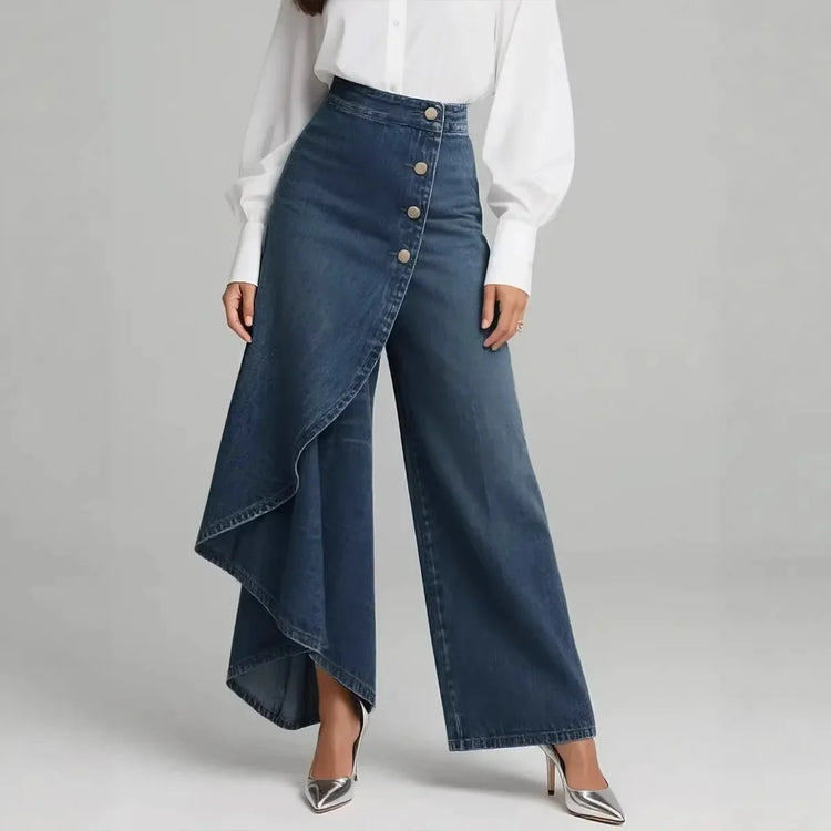 Asymmetrical wide-leg denim pants with button detail, high waist, and relaxed fit