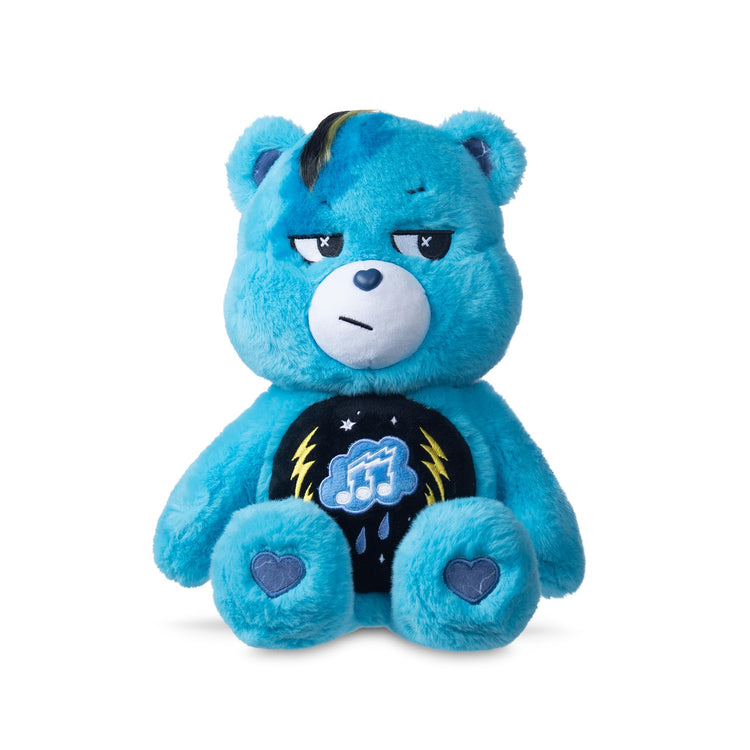 Blue 14-inch Rock-a-Lot Grumpy Bear plush with musical belly badge and lightning paw prints
