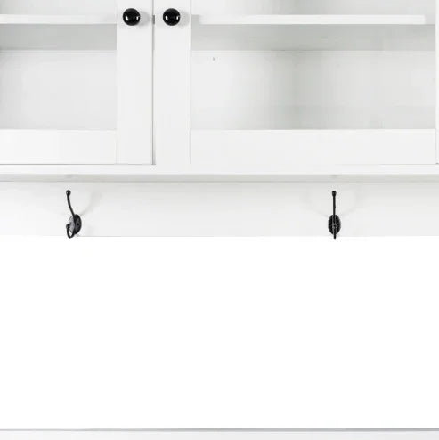 White wall-mounted shelf with cabinets, open shelves, and three metal hooks