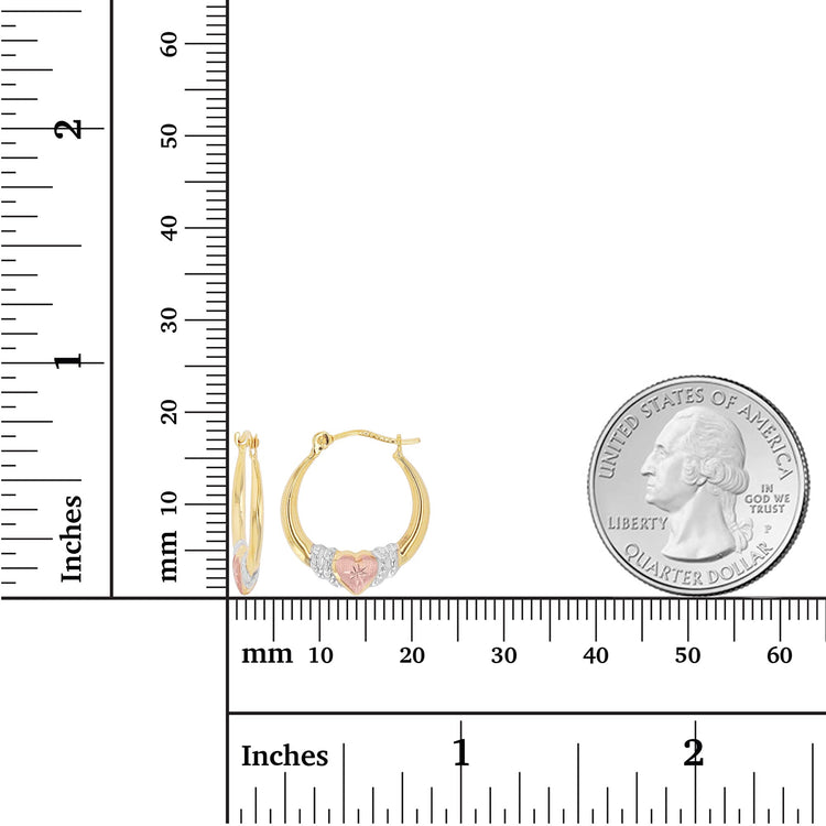 14K gold solid tricolor diamond cut heart hoop earrings next to a quarter for size comparison