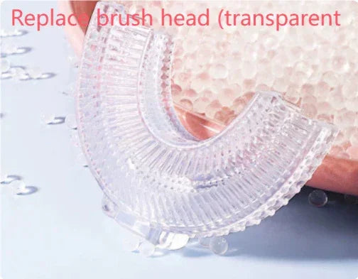 Transparent U-shaped replacement brush head with soft bristles on light background