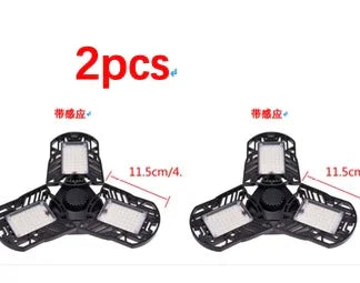 Set of two black foldable LED ceiling lights with three adjustable panels, 11.5 cm each.