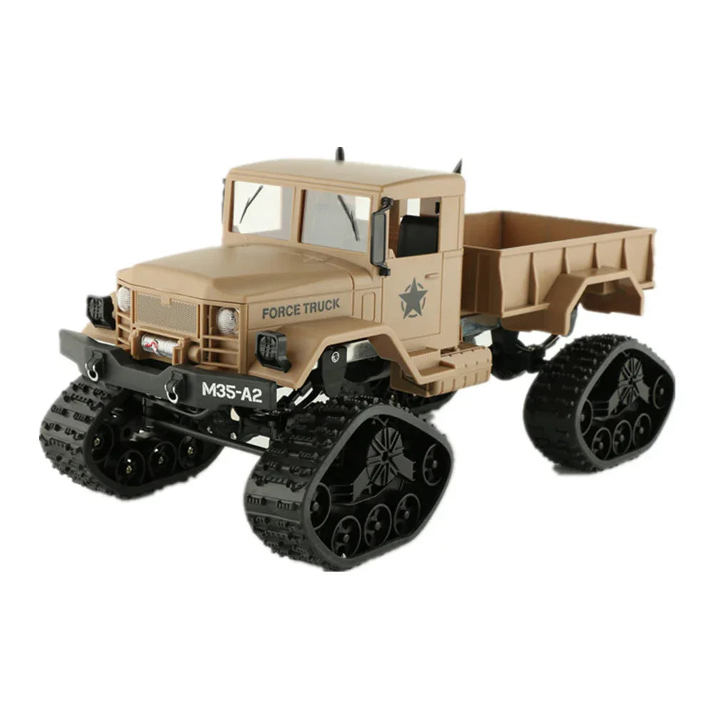 Tan military-style toy truck with rubber tank tracks and rugged detailing