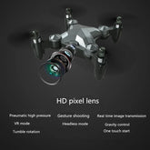 Black foldable drone with HD pixel camera lens and futuristic geometric design, compact fit