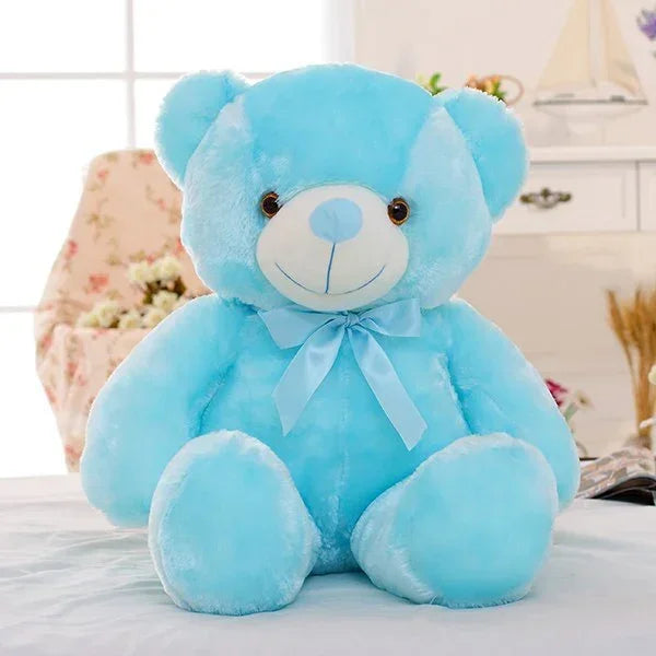 Plush light blue teddy bear with ribbon, ultra-soft fabric, oversized, cozy fit