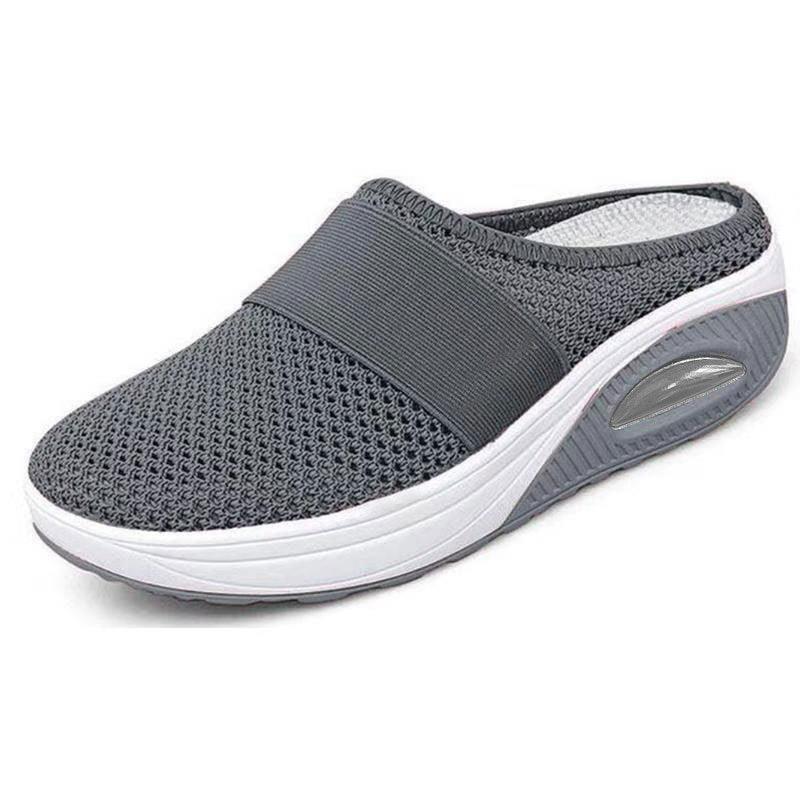 Gray slip-on mesh clog with breathable upper, elastic band and white platform sole