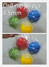 Set of eight plastic balls in red, blue, green, and yellow, packaged in clear plastic.