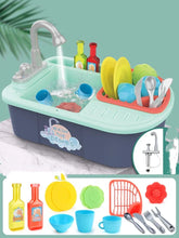 Colorful plastic toy kitchen sink set with play dishes, utensils, and running water feature