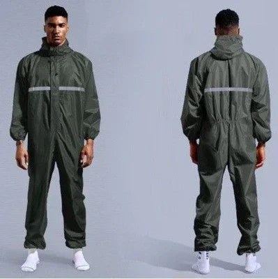 Man wearing a dark green, full-body streetwear jumpsuit with reflective stripe, relaxed fit