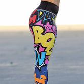 High-waisted leggings with colorful graffiti print, slim fit, stretch material
