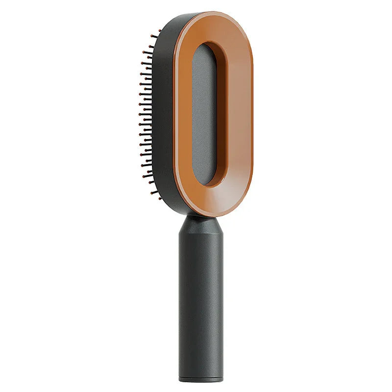 Modern oval hairbrush with brown and black body, ergonomic handle, and spaced bristles