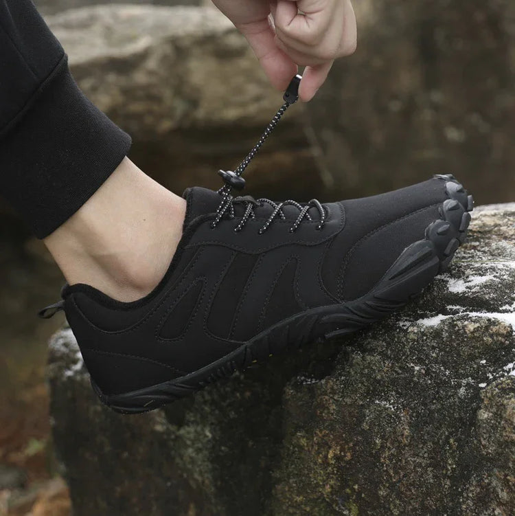 Black athletic outdoor sneaker with rugged sole and adjustable drawstring lace, slip-resistant fit
