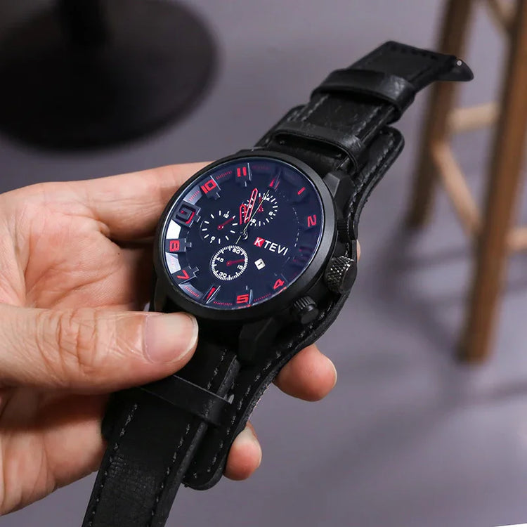 Black leather strap wristwatch with red dial accents and sporty, modern design