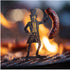 Metal silhouette in vintage suit holding grilled sausage over campfire, outdoor BBQ scene