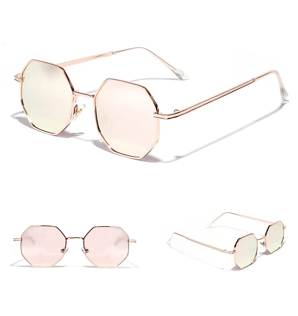 Geometric rose gold sunglasses with octagonal pink-tinted lenses and slim metal frame