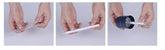 Hands assembling and placing a white plastic pen into a dark blue cylindrical case