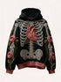 Black hoodie with 3D embroidered skeleton, heart, and floral rose details, relaxed fit.